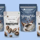 Sustainable packaging of Berry coffee products featuring the brand's distinctive logo.