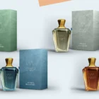 Variety of Swaas fragrance bottles lined up on a wooden shelf.