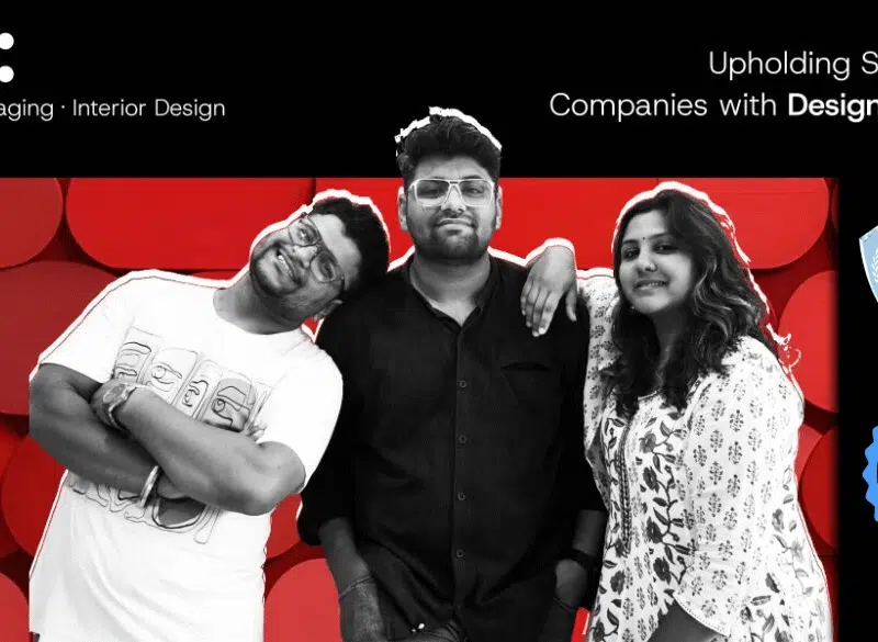 Professional team photo of The Factor X (TFX), a branding, packaging, and interior design agency based in Indore. The image features the three core team members against a bold, red geometric background. Text highlights their mission: 'Upholding Startups and Companies with Design & Strategy.
