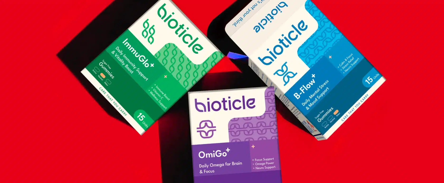 Bioticle supplements packaging hero, three gummy boxes ImmuGlo+, B Flow+, OmiGo+ on red backdrop, FMCG branding and packaging design by The Factor X.