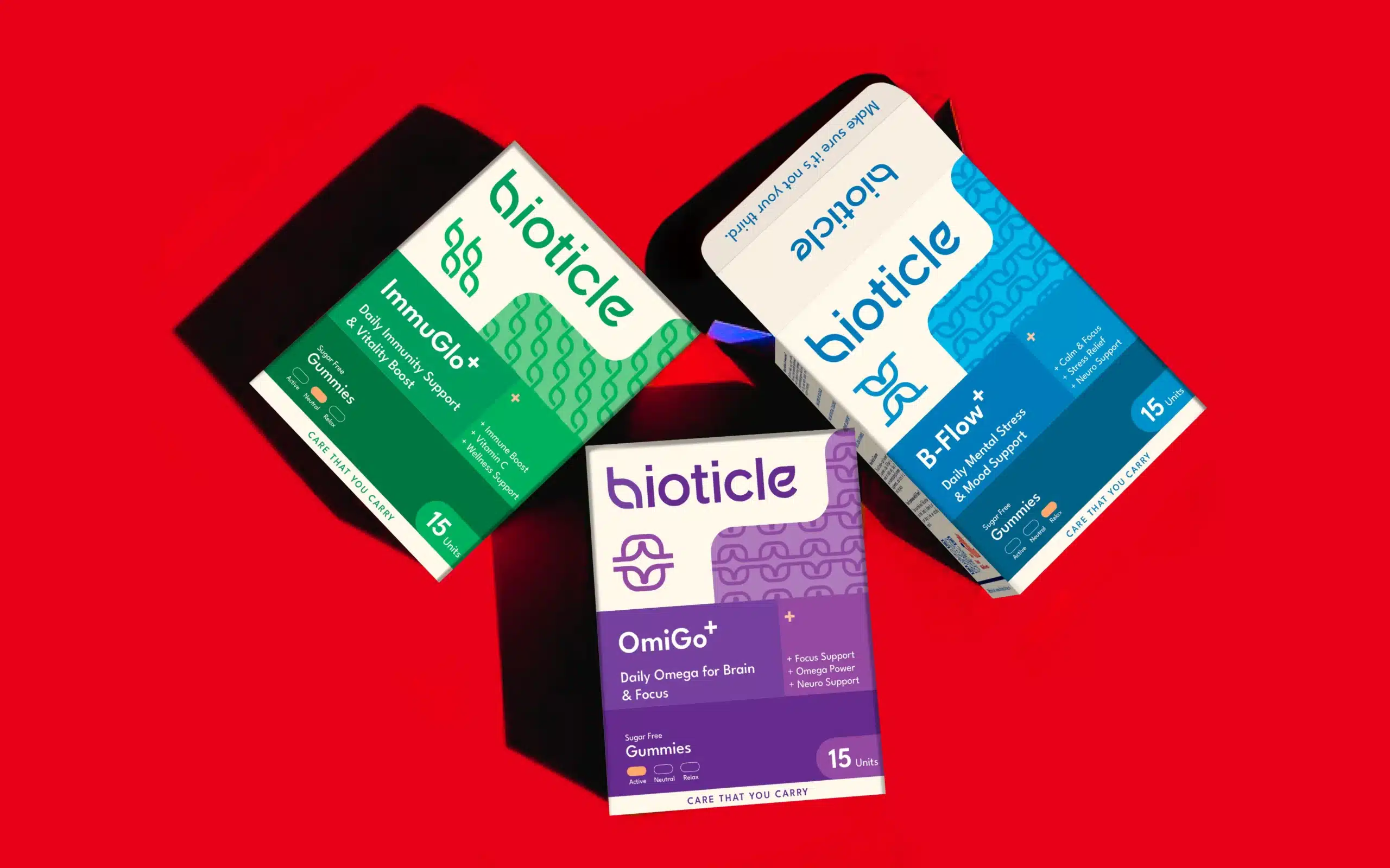Bioticle gummies hero on red, ImmuGlo+, B-Flow+, OmiGo+, bold color coding and icon patterns, wellness branding and packaging design by The Factor X.