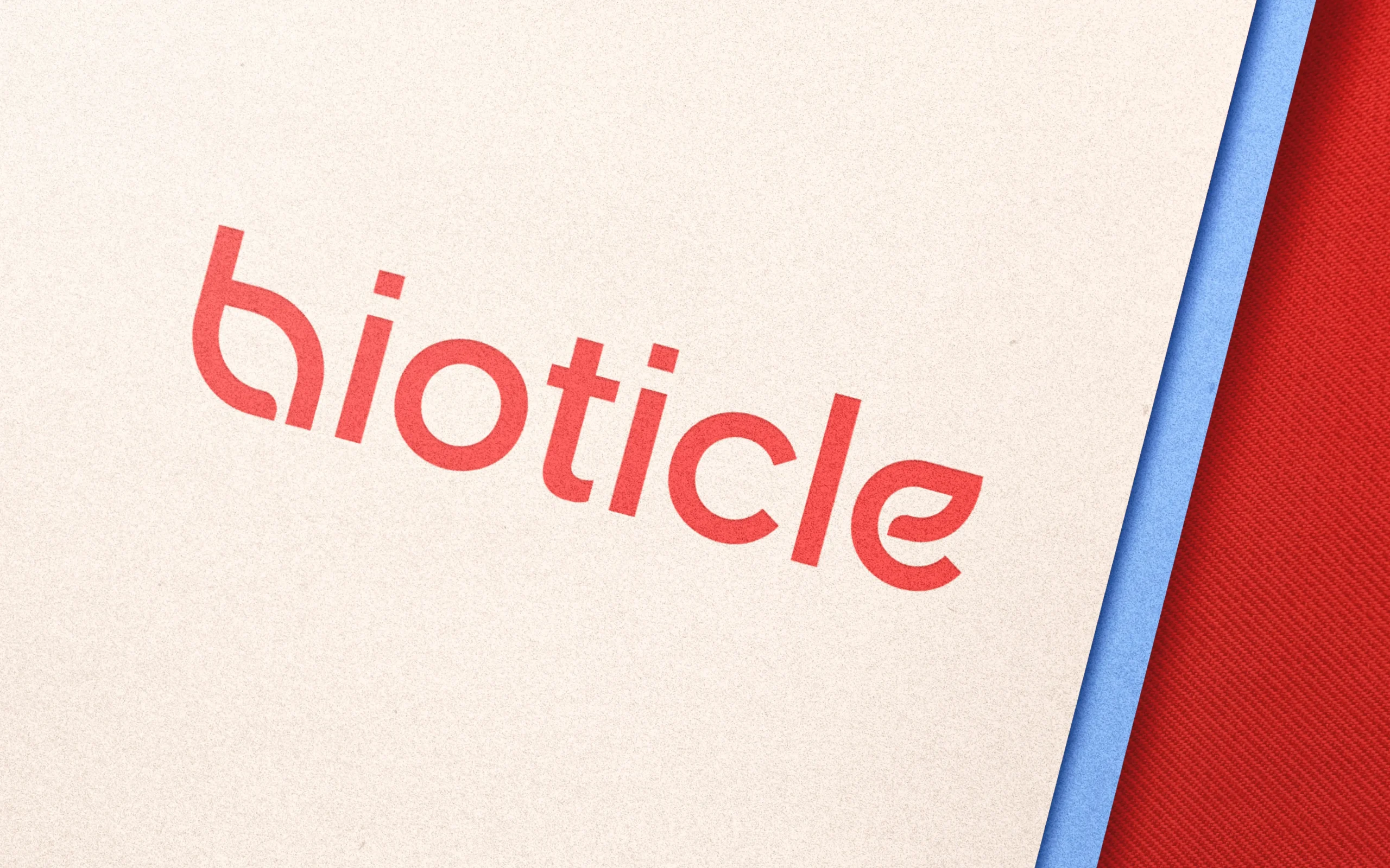 Bioticle wordmark logo on textured paper - brand identity and minimalist branding presentation